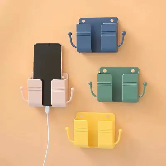 ¡Dile adiós al desorden con el innovador Soporte Adhesivo para Teléfono con Ganchos y Caja de Almacenamiento! Este práctico y funcional accesorio es la solución ideal para mantener tu teléfono móvil y controles remotos organizados
