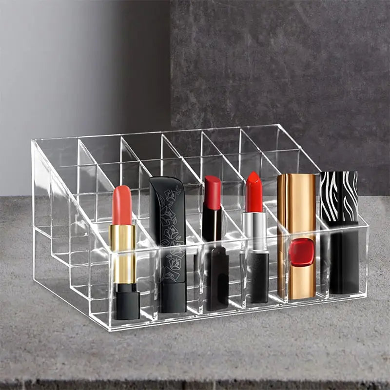 Estás buscando una manera funcional de organizar tus lápices labiales y esmaltes de uñas ,El Soporte Acrílico para Lápices Labiales de 24 Rejillas es la solución perfecta para mantener tus cosméticos organizados, accesibles y siempre a la vista