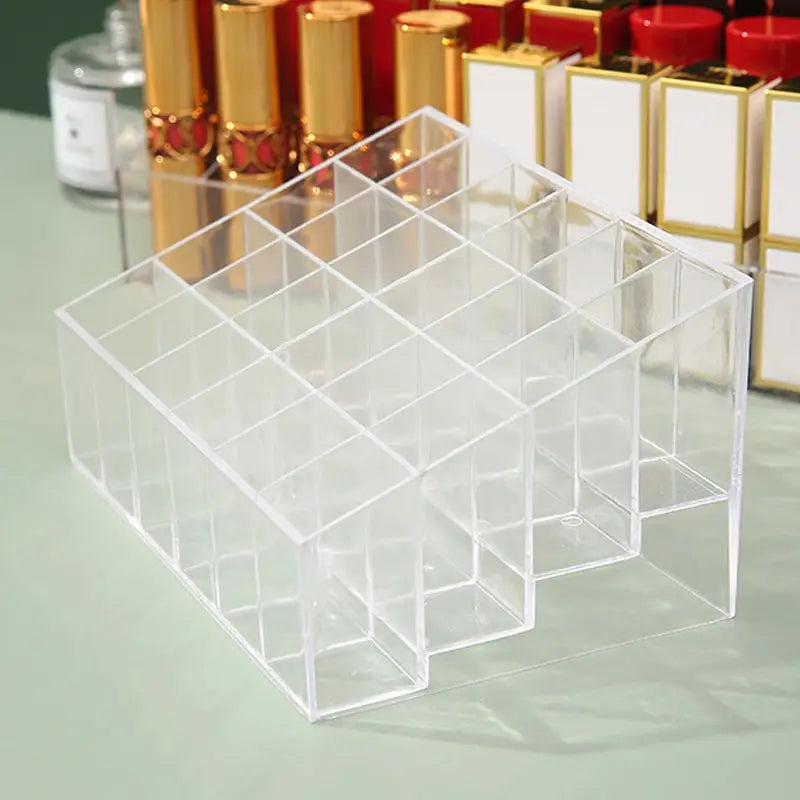 Estás buscando una manera funcional de organizar tus lápices labiales y esmaltes de uñas ,El Soporte Acrílico para Lápices Labiales de 24 Rejillas es la solución perfecta para mantener tus cosméticos organizados, accesibles y siempre a la vista