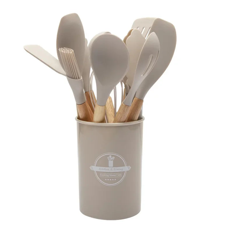 Renueva tu Cocina con este completo juego de Utensilios de Silicona con mango de madera.